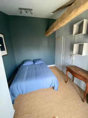 Un ou plusieurs lits dans un hébergement de l'établissement Superbe appartement calme et indépendant