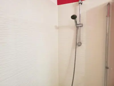 Salle de bains dans l'établissement Le Petit Versailles