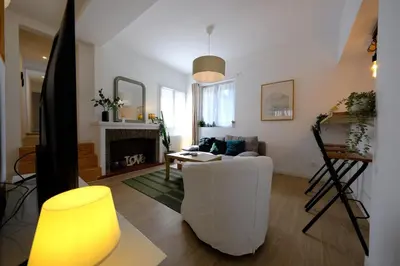 Coin salon dans l'établissement Proche Rouen - Magnifique T4 - 3 chambres