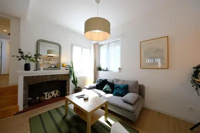 Coin salon dans l'établissement Proche Rouen - Magnifique T4 - 3 chambres