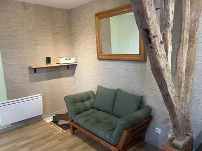 Coin salon dans l'établissement GITE La Grange