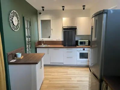 Cuisine ou kitchenette dans l'établissement GITE La Grange
