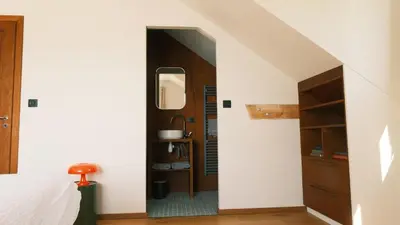 Un ou plusieurs lits dans un hébergement de l'établissement Maison Canadienne au bord du lac