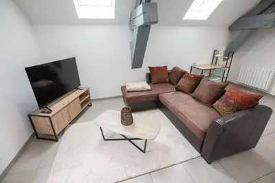 Coin salon dans l'établissement Appartement spacieux et lumineux