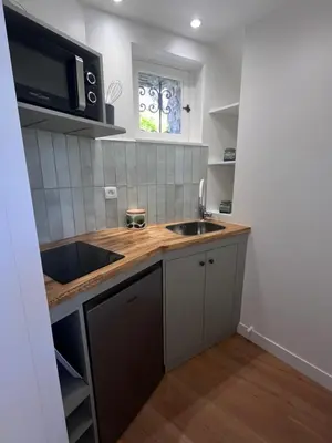 Cuisine ou kitchenette dans l'établissement Petite maison indépendante