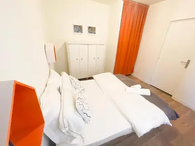 Un ou plusieurs lits dans un hébergement de l'établissement L'Hauss'Rouennais - Appartement 2 pièces - Centre historique Rouen