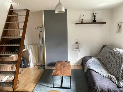 Coin salon dans l'établissement CosyAppart - LE ROBEC