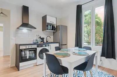 Cuisine ou kitchenette dans l'établissement Appartement La Rive Rouen proche centre historique