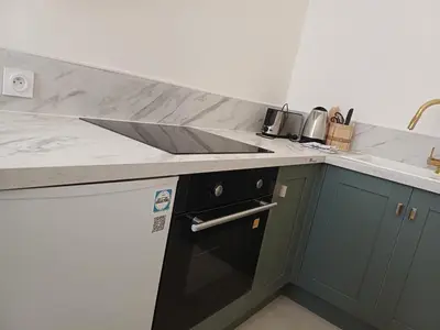 Cuisine ou kitchenette dans l'établissement Epicurien