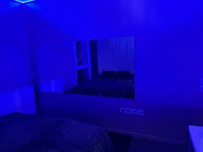 Un ou plusieurs lits dans un hébergement de l'établissement Appartement luxueux avec jacuzzi Cergy gare