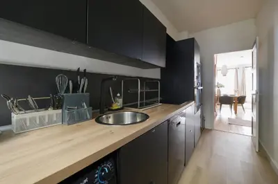 Cuisine ou kitchenette dans l'établissement Casa Tierra - Élégance et sérénité en centre-ville