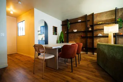 Cuisine ou kitchenette dans l'établissement Triplex Design avec Rooftop et Salle Cinéma