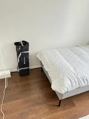 Un ou plusieurs lits dans un hébergement de l'établissement Confort et Verdure 2 Pièces Moderne avec Parking à Domont by Immo Kit Bnb