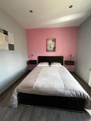 Un ou plusieurs lits dans un hébergement de l'établissement Gîte du Camp de César - WIFI - 8 personnes