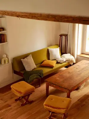 Coin salon dans l'établissement Ferme des Millonets - grand gîte