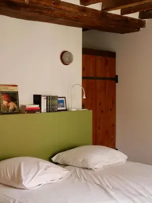 Un ou plusieurs lits dans un hébergement de l'établissement Ferme des Millonets - grand gîte