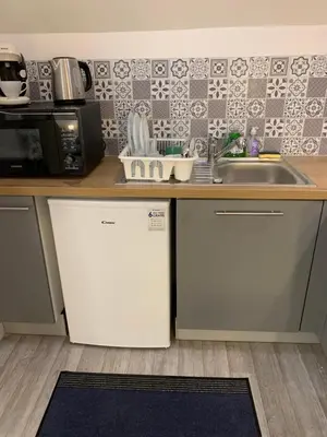 Cuisine ou kitchenette dans l'établissement Studio 2 A3M Locations