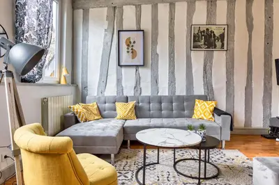 Coin salon dans l'établissement Le Auguste charmant duplex avec terrasse