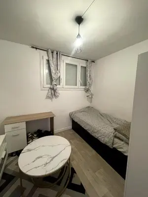 Un ou plusieurs lits dans un hébergement de l'établissement Cozy Furnished Studio near Paris, Quiet & Well-Located in Taverny
