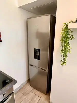 Cuisine ou kitchenette dans l'établissement L'Orée du Jardin T3 parking
