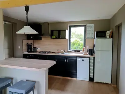Cuisine ou kitchenette dans l'établissement L'Henridette
