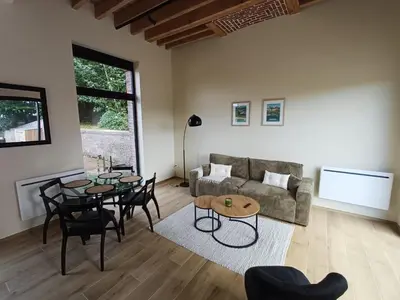 Coin salon dans l'établissement Le Gîte du Monastère Luxe discret entre plage à 5minutes et campagne normande Parking 2 voitures