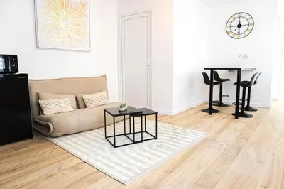 Coin salon dans l'établissement Le Soleil Cormeillais