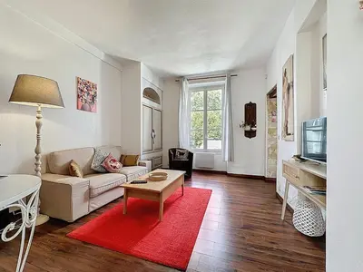Coin salon dans l'établissement Beautiful apartment in Chantilly center