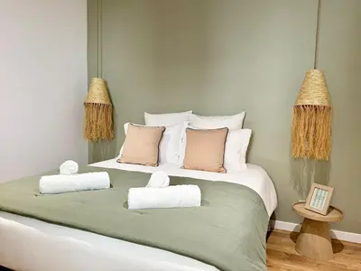 Un ou plusieurs lits dans un hébergement de l'établissement Appartement le Cocoon, 5 min du port