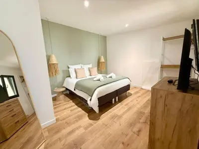 Un ou plusieurs lits dans un hébergement de l'établissement Appartement le Cocoon, 5 min du port