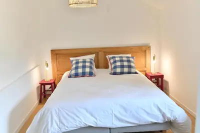 Un ou plusieurs lits dans un hébergement de l'établissement La Maison Forestière
