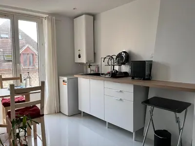 Cuisine ou kitchenette dans l'établissement Agréable appartement neuf et lumineux