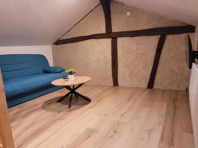 Coin salon dans l'établissement La cour Royale