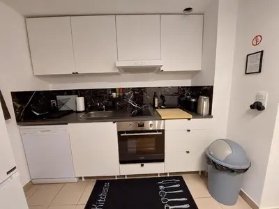 Cuisine ou kitchenette dans l'établissement Cosy Home 4 - Spacieux studio avec parking - 30 min Paris
