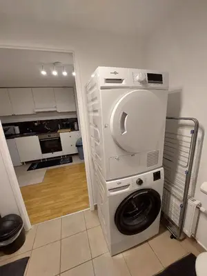 Cuisine ou kitchenette dans l'établissement Cosy Home 4 - Spacieux studio avec parking - 30 min Paris