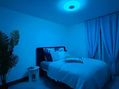 Un ou plusieurs lits dans un hébergement de l'établissement Apartment T2 L'Isle Adam, Garden Terrace