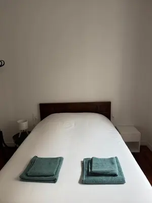 Un ou plusieurs lits dans un hébergement de l'établissement Appartement haussmannien dans le centre de Rouen