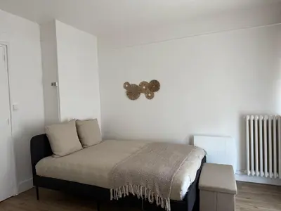 Un ou plusieurs lits dans un hébergement de l'établissement Studio cosy en hypercentre de Louviers