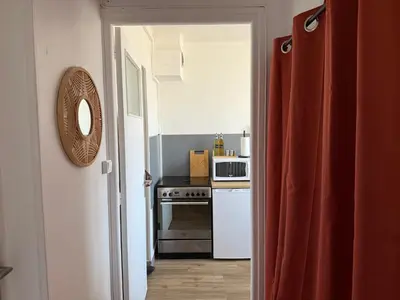 Cuisine ou kitchenette dans l'établissement Studio cosy en hypercentre de Louviers