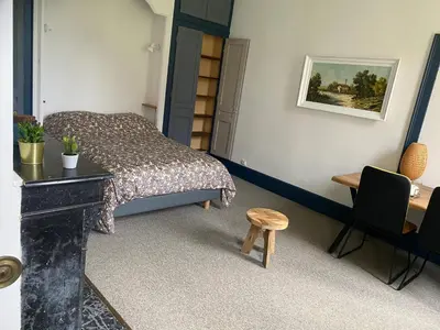 Coin salon dans l'établissement Appartement confortable aux Andelys - 90 m² avec parking
