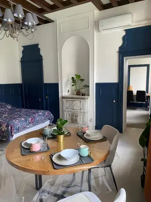 Coin salon dans l'établissement Appartement confortable aux Andelys - 90 m² avec parking