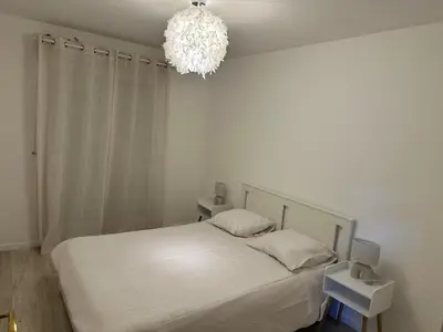 Un ou plusieurs lits dans un hébergement de l'établissement Apt 5p standing - Paris Cergy pontoise