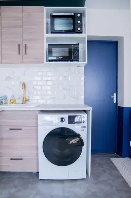 Cuisine ou kitchenette dans l'établissement Art, confort et lit d'exception