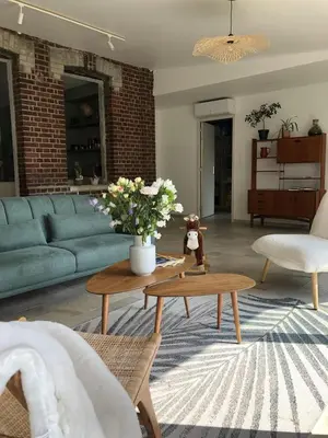Coin salon dans l'établissement Maison de vacances de charme 8-10 personnes