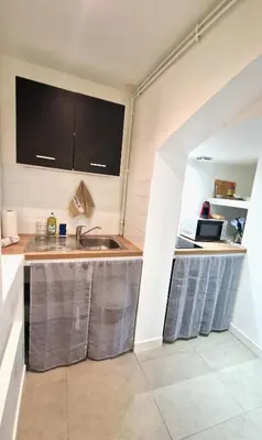 Cuisine ou kitchenette dans l'établissement Le saint Paul