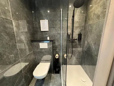 Salle de bains dans l'établissement Le deux-pièces du Clos du Bourgage