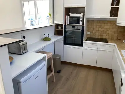Cuisine ou kitchenette dans l'établissement Georgette-sur-Mer