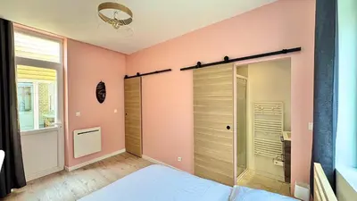 Un ou plusieurs lits dans un hébergement de l'établissement Maison design 11 pers -Terrasse -Netflix -Confort