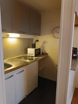 Cuisine ou kitchenette dans l'établissement Hypercenter apartment
