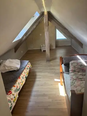 Un ou plusieurs lits dans un hébergement de l'établissement Gîte des vaux